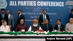 FILE: Pakistan's opposition parties leaders, from left, Maryam Nawaz, Shahbaz Sharif, Maulana Fazalur Rehman, Bilawal Bhutto Zardari, Yousuf Raza Gillani, and Mahmood Khan Achakzai during the all parties conference in Islamabad on June 26.