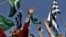 Supporters of Islamic parties hold party flags and shout slogans as they demand punishment for Aasia Bibi, the Christian woman sentenced to death for blasphemy, at a rally in Karachi last month.