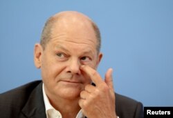 Cancelarul Germaniei, Olaf Scholz, în timpul unei conferințe de presă de la Berlin, 11 august 2022.