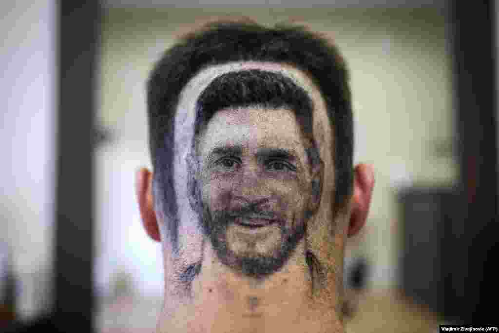 هوادار آرژانتین با آرایش مویی شبیه صورت مسی