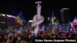 Protesters rallied in Bucharest on October 2. Romania has fully vaccinated only one-third of all adults, making it the second-least-vaccinated EU member state after Bulgaria.