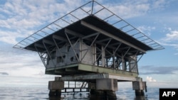 Vedere asupra unei platforme petroliere din sudul lacului Maracaibo, în largul coastei Venezuelei, pe 9 septembrie 2021. Rusia s-a implicat activ în ultimele decenii în industria petrolieră a țării sud-americane.