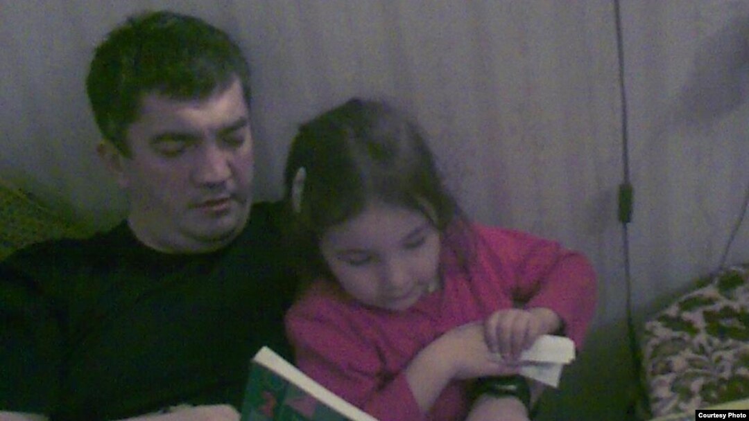 Marat Gunashev, seen here with his daughter in an undated family photo, has been held in detention since being apprehended on November 28 in the operating theater of the Makhachkala hospital where he worked.