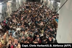 This image distributed courtesy of the U.S. Air Force shows the inside of Reach 871, a U.S. Air Force C-17 Globemaster III aircraft flown from Kabul to Qatar on August 15, 2021.