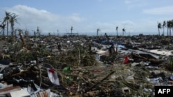 A general view of flattened houses along the coastal area in Tacloban, on the eastern island of Leyte, on November 10, 2013, after Typhoon Haiyan swept over the Philippines.