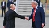US President Donald Trump greets Russian President Vladimir Putin ahead of their meetins in Anchorage in August. 