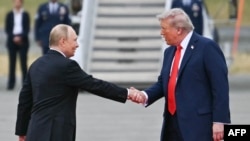 Putin și Trump în Alaska, la 15 august 2025.