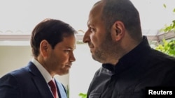 US Secretary of State Rubio (left) and Ukraine's Rustem Umerov meet in Florida on November 30 in an effort to thrash out a peace proposal.