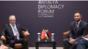 Turkey - Turkish diplomat Serdar Kilic (left) and Armenian parliament vice-speaker Ruben Rubinian meet in Antalya, April 11, 2025.