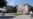 Moldova, People walk down the street with the Gagauzia People's Assembly building in the background, Comrat, July 29, 2026