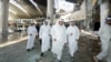 Kuwaiti Prime Minister Sheikh Ahmad al-Abdullah al-Sabah (center) inspects the damaged airport after an Iranian air strike, in Kuwait City on June 3.