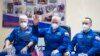 Mark Vande Hei of NASA (left) and Oleg Novitskiy and Pyotr Dubrov (right) of Roskosmos take part in a press conference at the Baikonur Cosmodrome in Kazakhstan, on April 8, 2021.