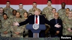 U.S. President Donald Trump delivers remarks to U.S. troops during an unannounced visit to Bagram Air Base on November 28.