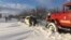 Rescuers help drivers trapped in the Mykolayiv region following heavy snowfall on November 27.