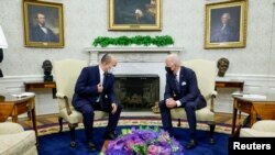 Israeli Prime Minister Naftali Bennett (left) with President Joe Biden at the White House on August 27.