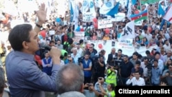 Opposition leader Ali Kerimli addressing a crowd of Azerbaijani protesters at a Baku stadium on September 22.