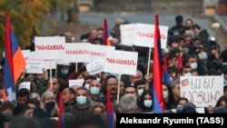 ARMENIA -- People protest during a rally against the country's agreement to end fighting with Azerbaijan over Nagorno-Karabakh. Yerevan, November 12, 2020