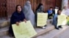 Members of the Hazara community of Shi'ite Muslims protest against the killing of Hazaras in Quetta.