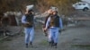 Azerbaijan servicemen near the town of Agdam while clearing land mines (file photo)