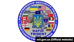 „Rapid Trident 2018” logo