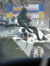 CRIMEA - Russian soldiers blockade Ukrainian military unit A-0669 in Kerch, Crimea, March 13, 2014