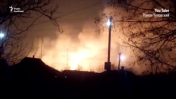 На военном складе в Харьковской области продолжаются взрывы (видео)