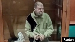 U.S. citizen Stephen Hubbard, accused of fighting as a mercenary for Ukraine, appears in a court in Moscow on October 7.