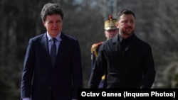 Президент Румунії Нікушор Дан (л) і його український колега Володимир Зеленський, Бухарест, 12 березня 2026 року