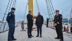 Montenegrin Foreign Minister Ervin Ibrahimovic (left) and his Croatian counterpart, Gordan Grlic Radman, meet aboard the Jadran sailing ship in Bar, Montenegro's main sea port, in January 2025. 

