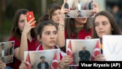 Students of Mehmet Akif College in Kosovo protest the arrest and deportation of their teachers.