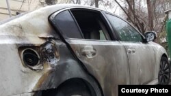 The burned-out car of Esenghazy Quandyq in Almaty