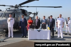 21 iunie - semnarea acordului la bordul HMS Destroyer în portul Odesa.