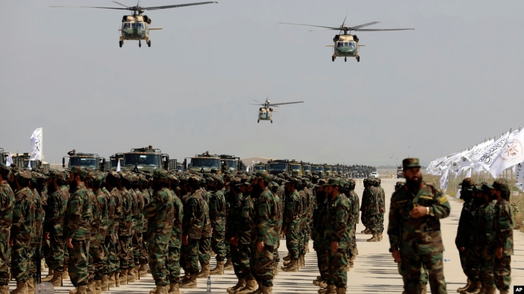US-made Black Hawk helicopters fly during a military parade in August 2024 at Bagram to mark the third anniversary of the withdrawal of US-led troops from Afghanistan.