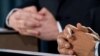 The hands of British Prime Minister Gordon Brown (left) and U.S. President Barack Obama are pictured as they addressed a joint press conference in London on April 1.