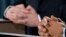 The hands of British Prime Minister Gordon Brown (left) and U.S. President Barack Obama are pictured as they addressed a joint press conference in London on April 1.