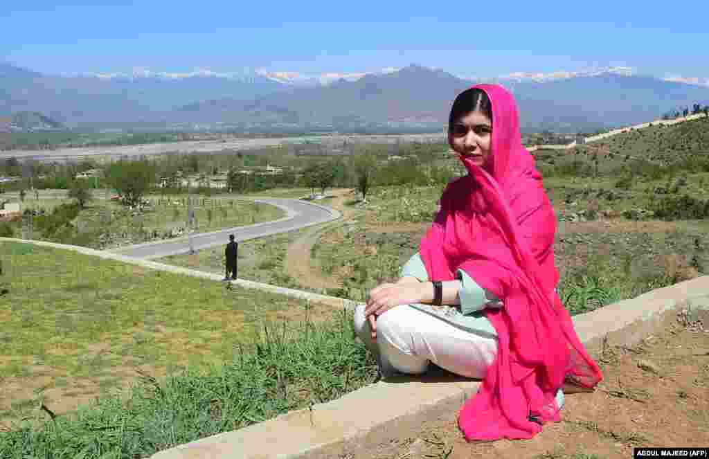 Yousafzai poses for a photograph on March 31, 2018, during her first visit home to Mingora in Pakistan&#39;s Swat Valley since being shot by Taliban militants.