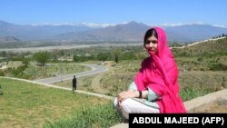 PAKISTAN -- Pakistani activist and Nobel Peace Prize laureate Malala Yousafzai poses for a photograph at all-boys Swat Cadet College Guli Bagh, during her hometown visit, some 15 kilometres outside of Mingora, on March 31, 2018. Malala Yousafzai landed in