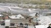 Kyrgyzstan -- Destroyed houses at the site of a major earthquake in Nura, 06Oct2008