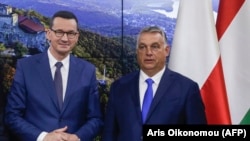 Prim ministrul polonez Mateusz Morawiecki (stânga) și prim ministrul ungar Viktor Orban , Bruxelles, septembrie 2020