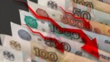 GENERIC – Red arrows pointing down on the background of russian money