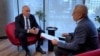 Former world chess champion Garry Kasparov speaks to RFE/RL's Mumin Shakirov in Warsaw on October 11. 