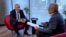Former world chess champion Garry Kasparov speaks to RFE/RL's Mumin Shakirov in Warsaw on October 11. 