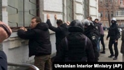 Police detain far-right activists in Kyiv on February 9.