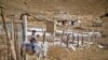 A boy rides a donkey in the village of Deman, near the Iranian border.