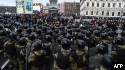 Police block protesters during a rally in support of jailed opposition leader Aleksei Navalny in St. Petersburg on January 31. 