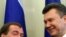 Медведев менен Янукович Харьковдо келишимге кол коюу аземинде. 21-апрель, 2010-ж.
