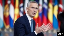 NATO Secretary-General Jens Stoltenberg speaks to reporters ahead of a NATO foreign ministers meeting in Brussels on April 3.