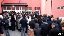 Voters crowd a polling station to cast ballots in Mitrovica, northern Kosovo, on February 9.