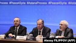 Russian Foreign Minister Sergei Lavrov (center), Iranian Foreign Minister Mohammad Javad Zarif (right) and Turkish Foreign Minister Mevlut Cavusoglu at an earlier round of Syria peace talks in Astana in March. (file photo)