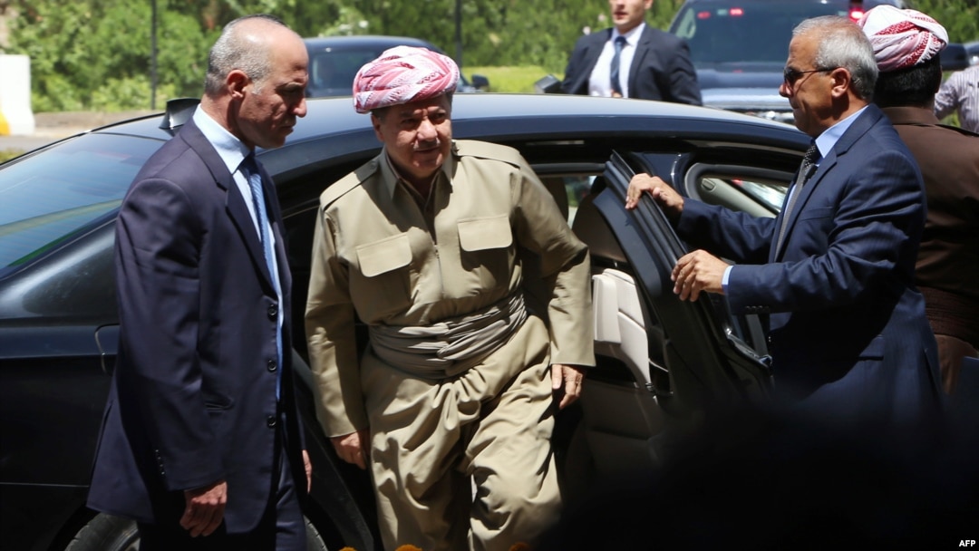 Kurdish leader Masud Barzani (center) has kept up a barrage of public statements suggesting the Kurdish region is now ready to move swiftly toward statehood. But is it?